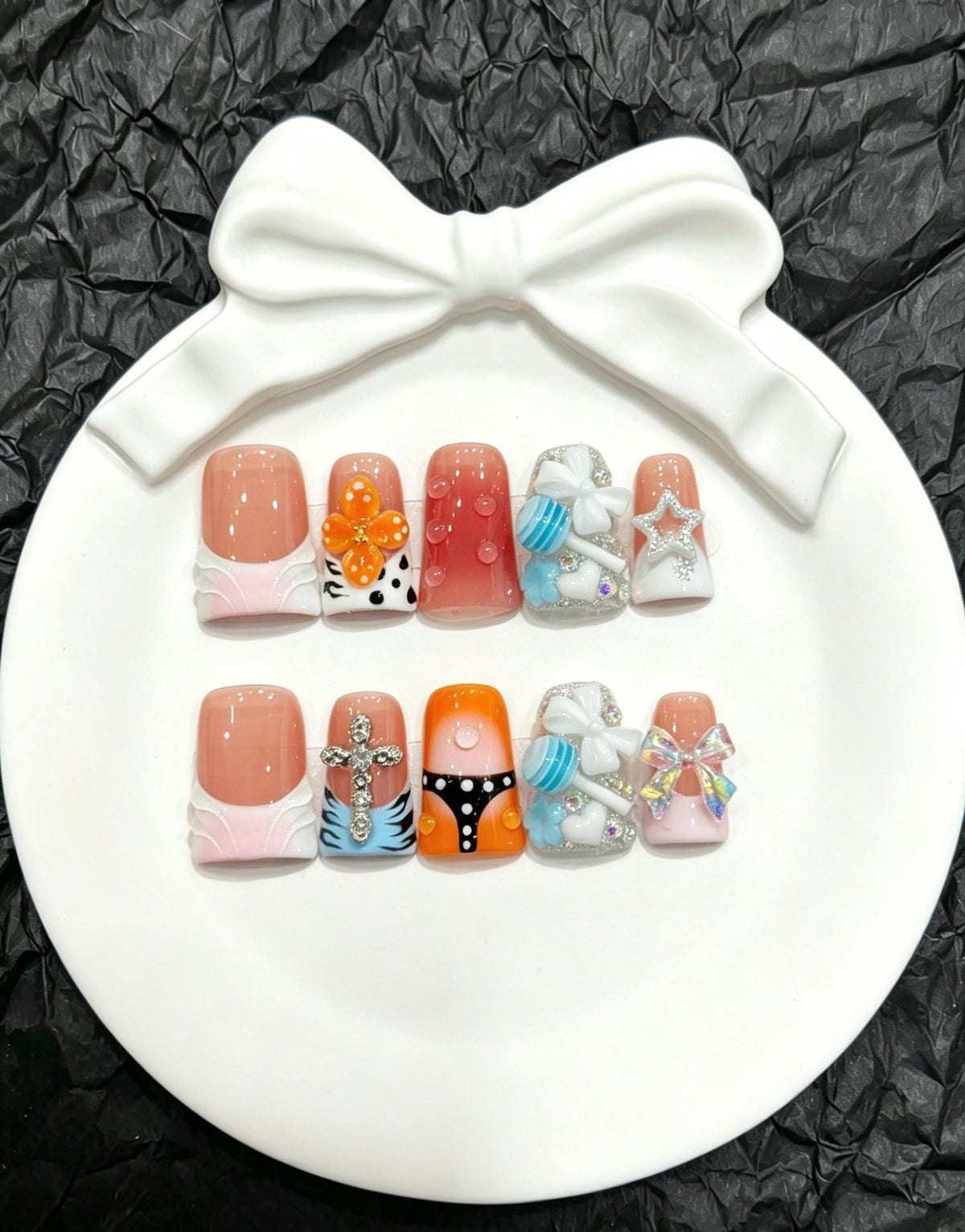 Press-On Nail Art Set with Decorative Accents and Unique Designs