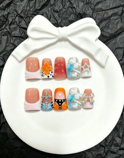 Press-On Nail Art Set with Decorative Accents and Unique Designs