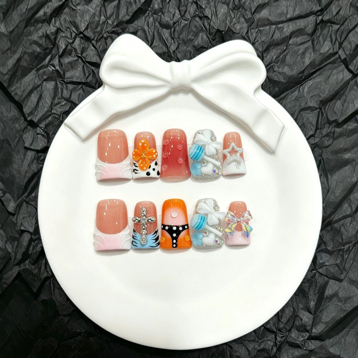 Press-On Nail Art Set with Decorative Accents and Unique Designs