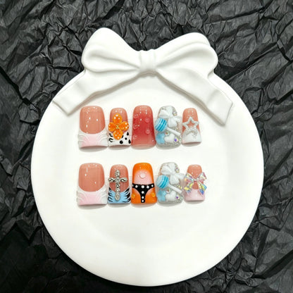 Press-On Nail Art Set with Decorative Accents and Unique Designs