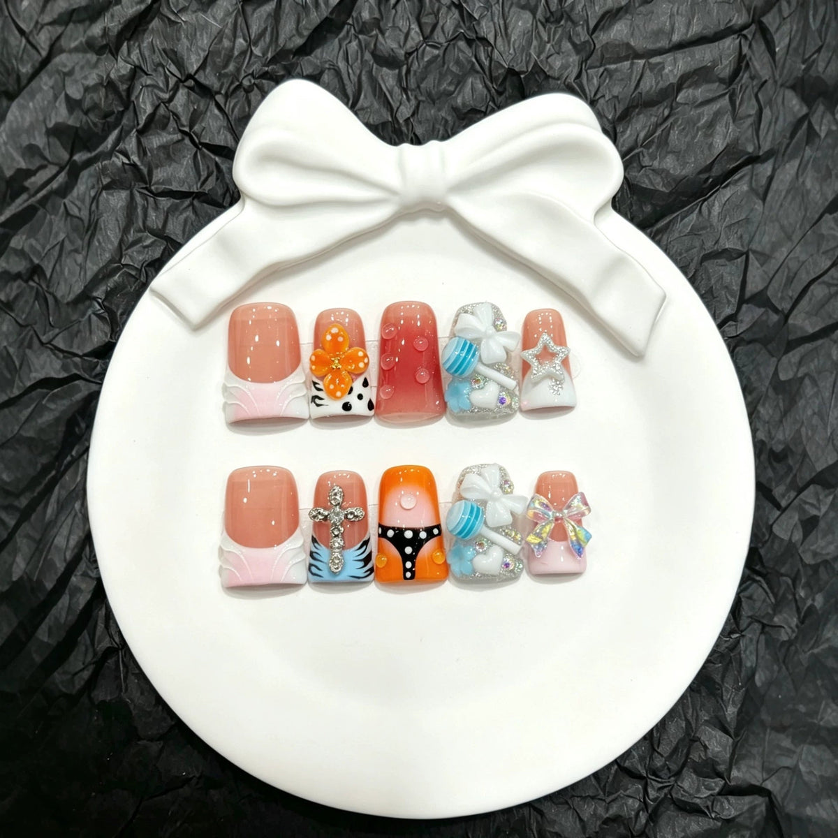 Press-On Nail Art Set with Decorative Accents and Unique Designs