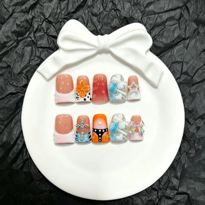 Press-On Nail Art Set with Decorative Accents and Unique Designs