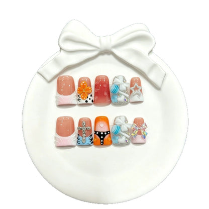 Press-On Nail Art Set with Decorative Accents and Unique Designs