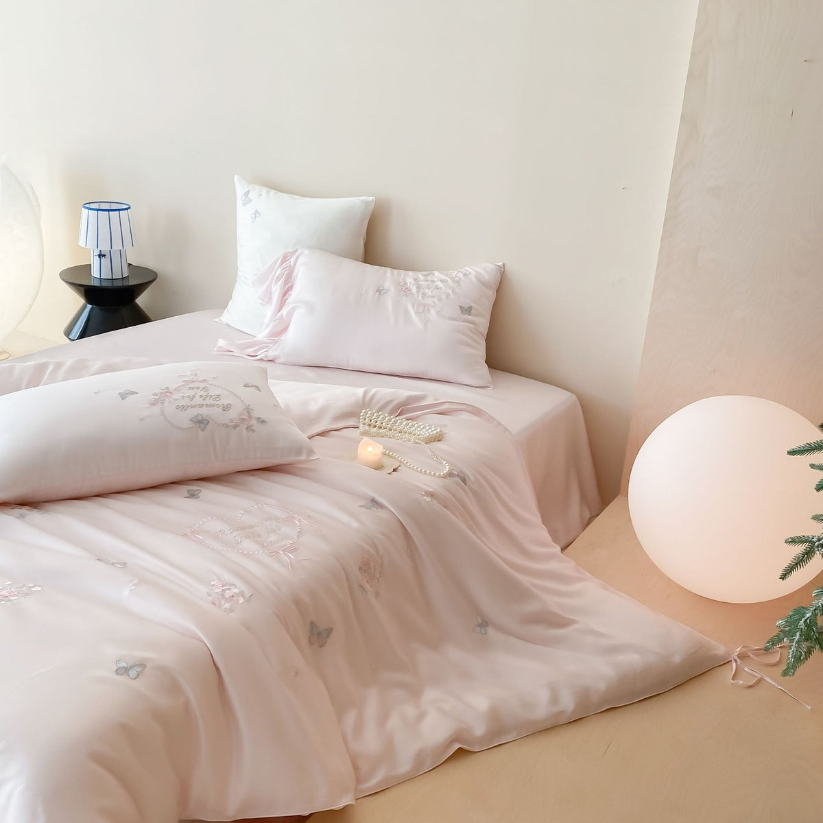 Romantic Satin Bedding Set with Embroidered Butterflies, Decorative Pillows, and Ruffles