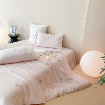 Romantic Satin Bedding Set with Embroidered Butterflies, Decorative Pillows, and Ruffles