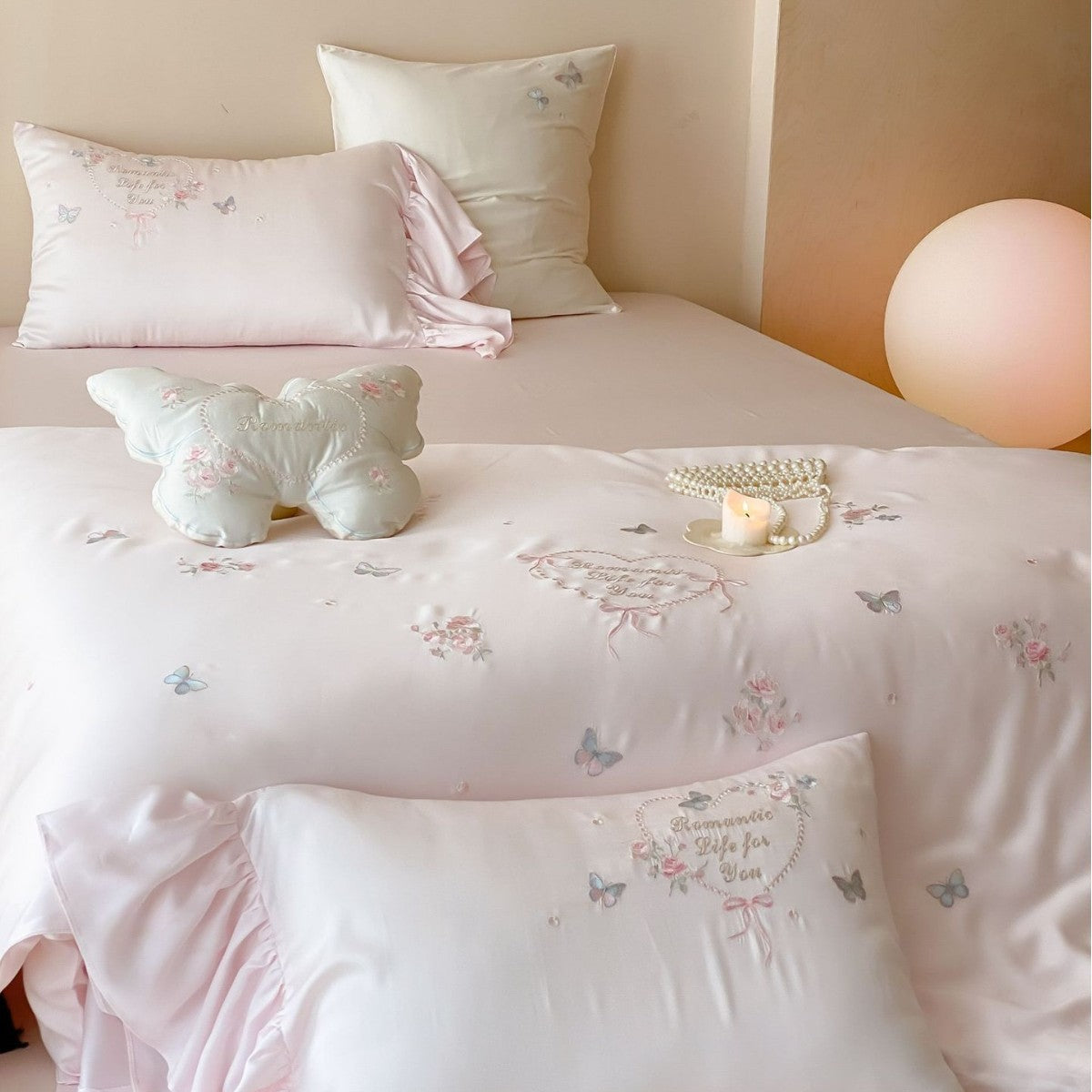 Romantic Satin Bedding Set with Embroidered Butterflies, Decorative Pillows, and Ruffles